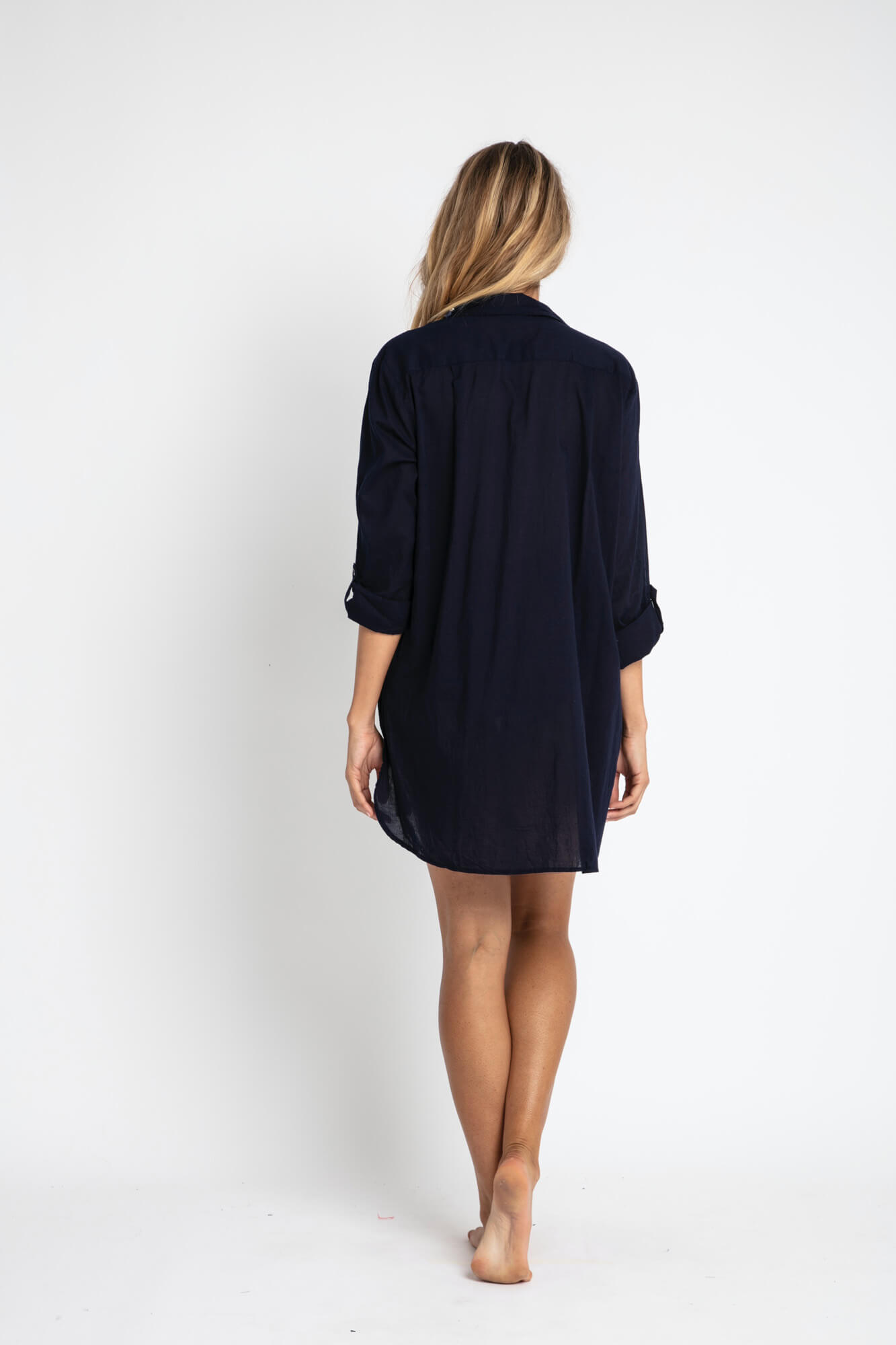 woman facing backward wearing Tencel fabric shirt dress